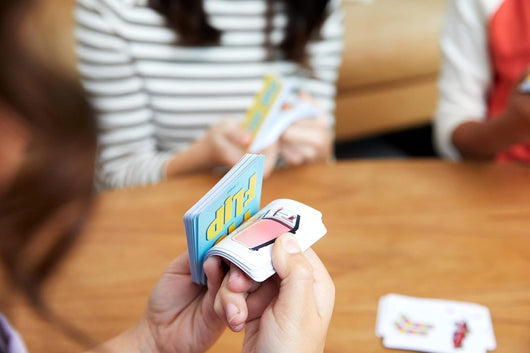 The Pic Flip Card Game by Mattel Games is the perfect game for a quick burst of fun for ages 7 and up